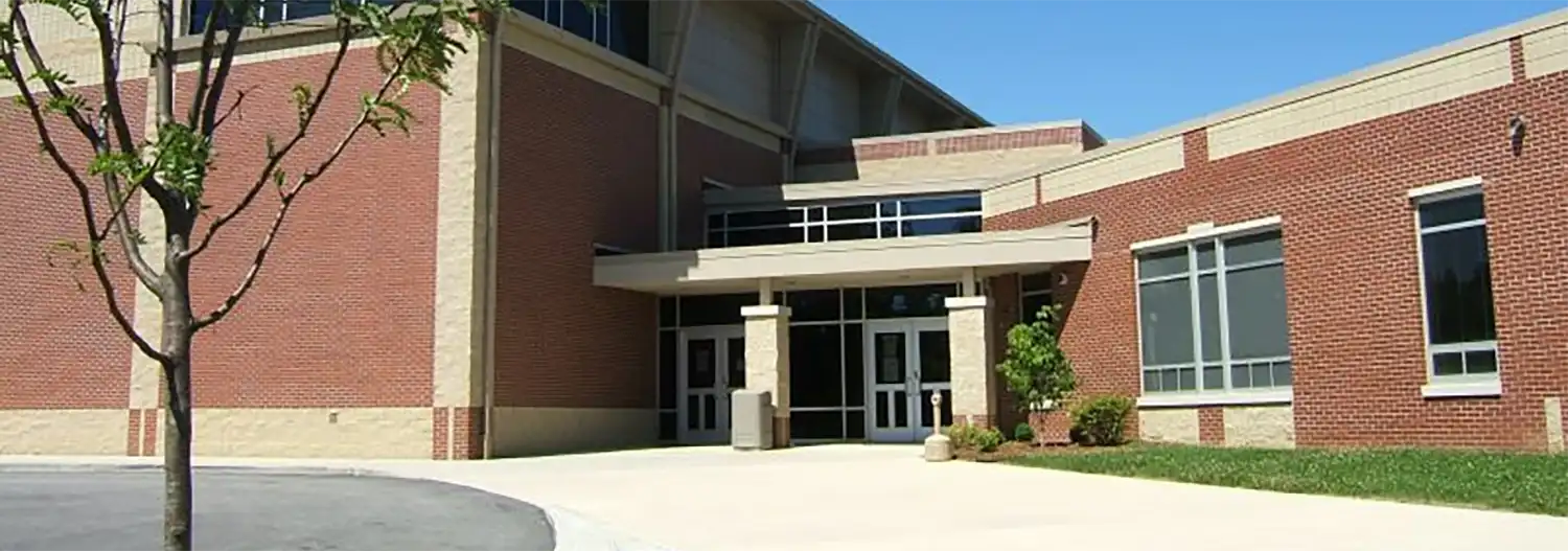 The brick entrance of the Deering Elementary building.