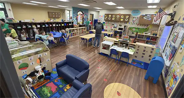 Inside a Getaway classroom, with learning centers, cubbies, and a reading corner.